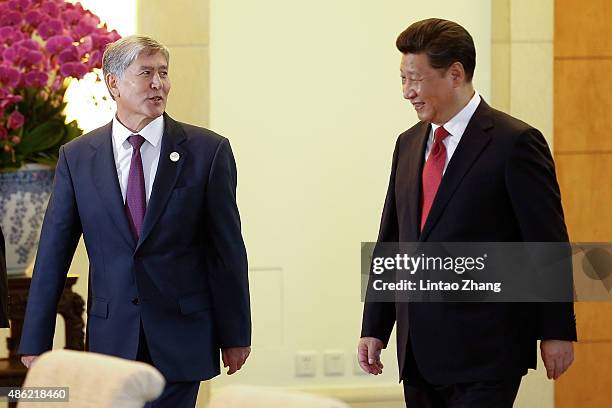 Chinese President Xi Jinping with Kyrgyzstan's President Almazbek Atambayev attend a meeting at Diaoyutai State Guesthouse on September 2, 2015 in...