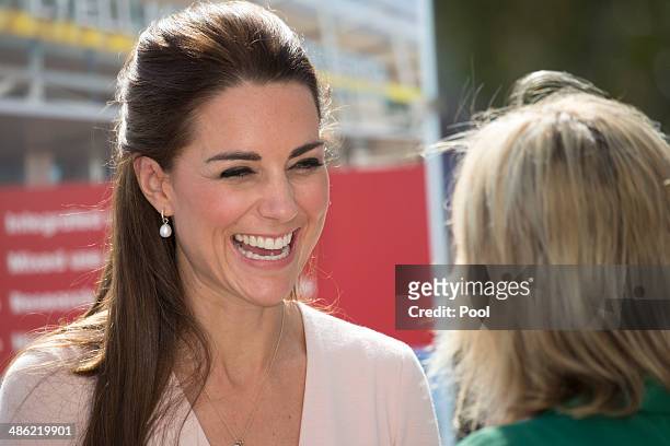 Catherine, Duchess of Cambridge laughs during their visit to Elizabeth on April 23, 2014 in Adelaide, Australia. The Duke and Duchess of Cambridge...