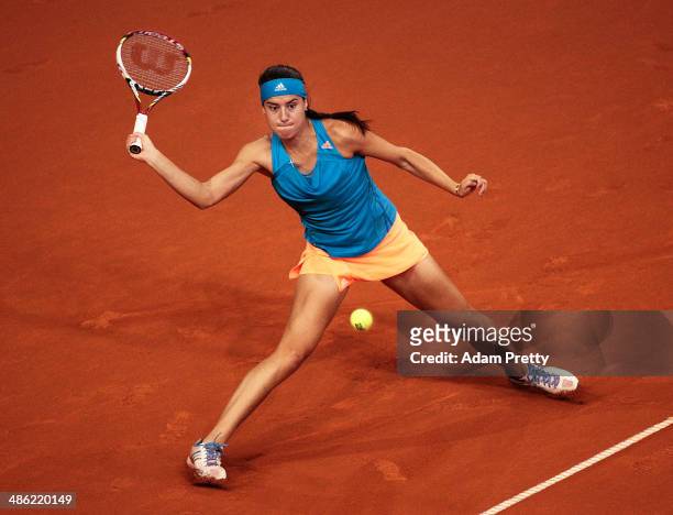 Sorana Cirstea of Romania hits a forehand during her match against Julia Goerges of Germany during day 3 of the Porsche Tennis Grand Prix 2014 at...