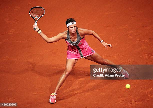 Julia Goerges of Germany hits a forehand during her match against Sorana Cirstea of Romania during day 3 of the Porsche Tennis Grand Prix 2014 at...