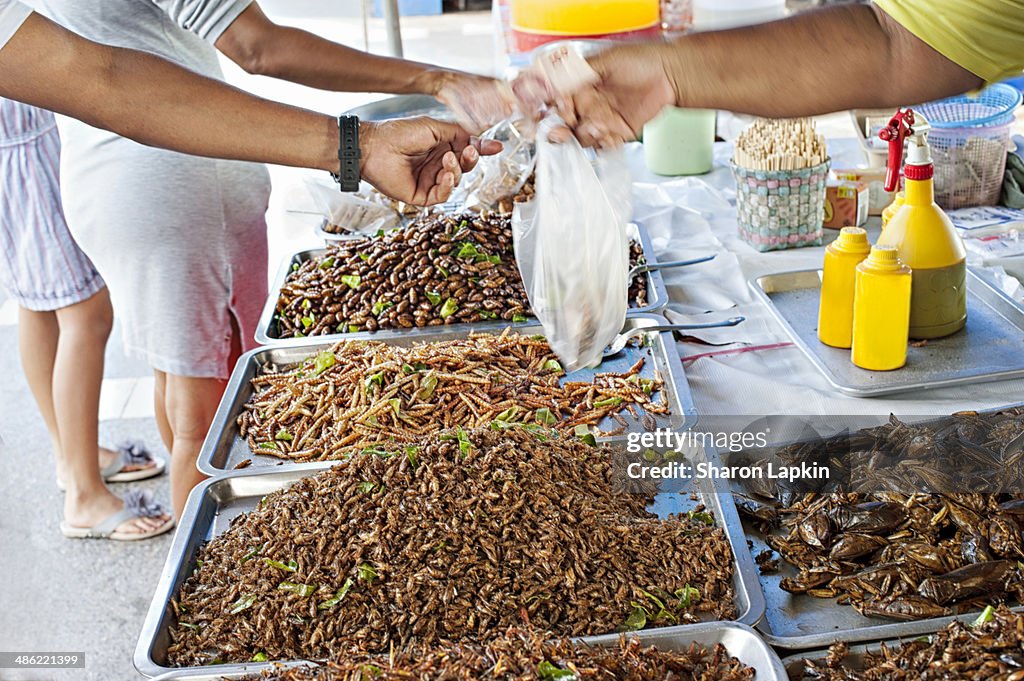 Buying fried insects
