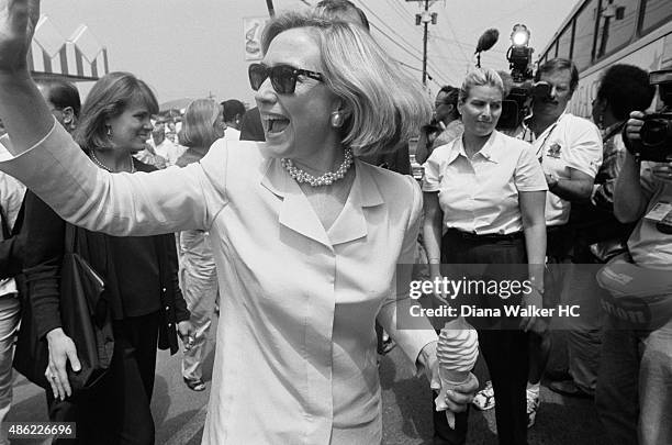 Presidential hopeful, Senator Hillary Clinton is photographed waving to the crowd on July 14, 1998 in Weedsport, New York. She is heading to the...