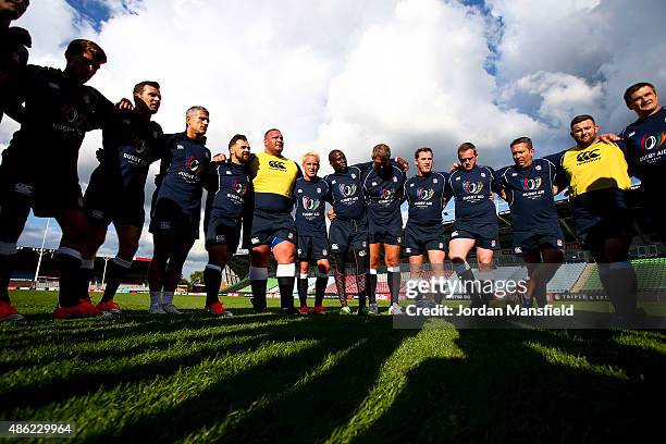 The Team England team huddle during the Rugby Aid 2015 celebrity rugby match media session at Twickenham Stoop on September 2, 2015 in London,...