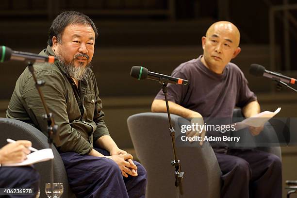 Chinese dissidents artist Ai Weiwei and poet Liao Yiwu attend a panel discussion at the Berlin International Literature Festival on September 2, 2015...