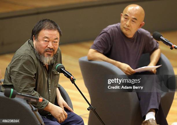 Chinese dissidents artist Ai Weiwei and poet Liao Yiwu attend a panel discussion at the Berlin International Literature Festival on September 2, 2015...