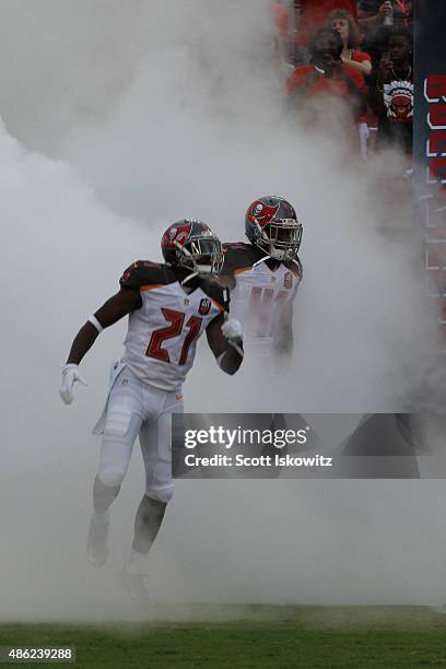 Cornerback Alterraun Verner of the Tampa Bay Buccaneers runs out of the tunnel for the preseason game between the Tampa Bay Buccaneers and the...