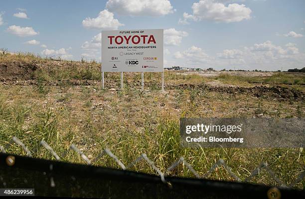 Toyota Motor Corp. Signage is displayed at the construction site of the company's new North America headquarters in Plano, Texas, U.S., on Tuesday,...