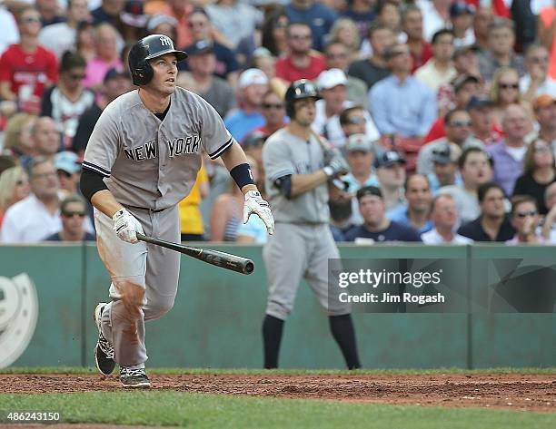 Stephen Drew of the New York Yankees hits a three-run home run in the third inning against he Boston Red Sox at Fenway Park on September 2, 2015 in...