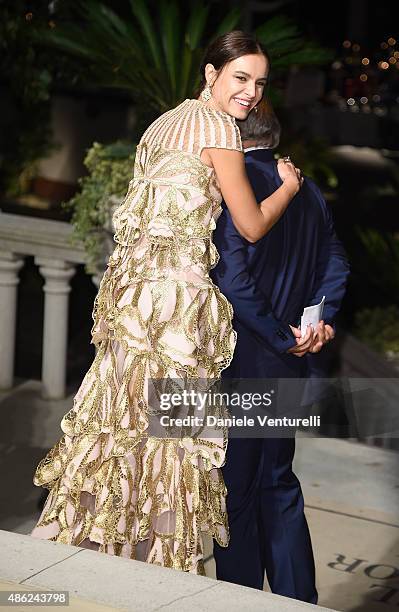 Domenico Procacci and Kasia Smutniak attend the opening dinner during the 72nd Venice Film Festival on September 2, 2015 in Venice, Italy.