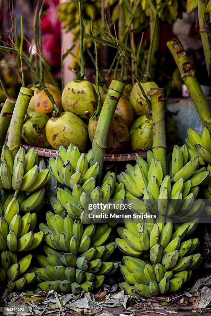 Bananas and coconuts at market