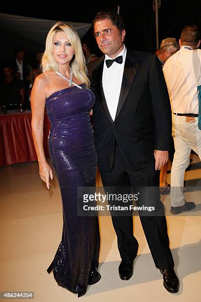 Marco De Benedetti and Paola Ferrari attend the opening dinner during the 72nd Venice Film Festival on September 2, 2015 in Venice, Italy.