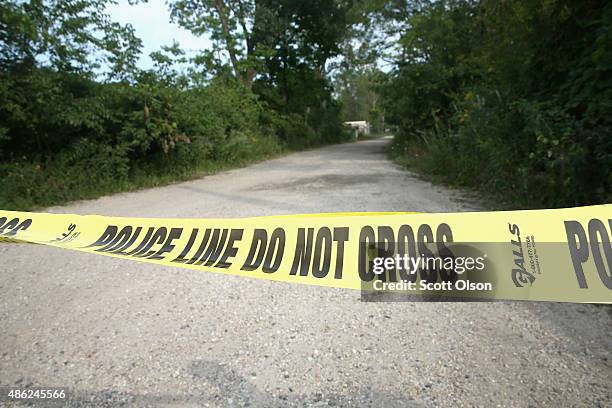 Crime scene tape is stretched across the entrance to the defunct cement plant where Lt. Joe Gliniewicz was killed on September 2, 2015 in Fox Lake,...