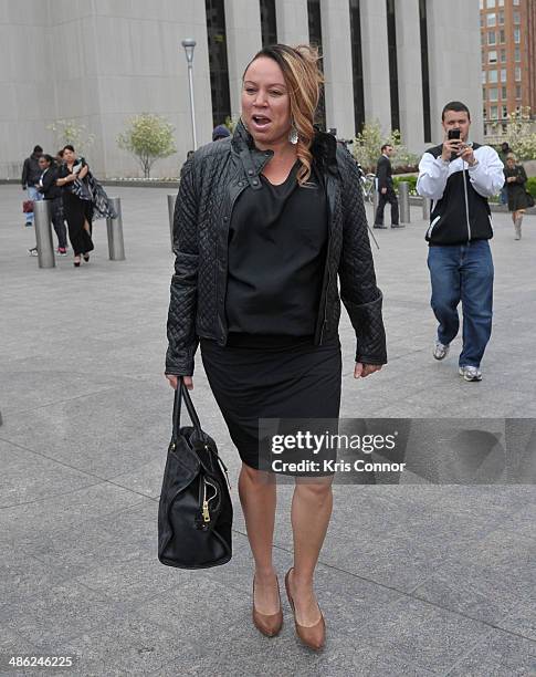 Joyce Hawkins leaves the H. Carl Moultrie 1 Courthouse after her son Chris Brown's assault trial has been posponed until June 25th due to his...