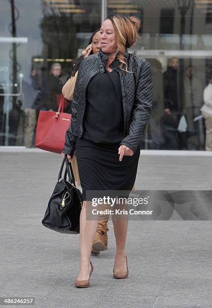 Joyce Hawkins leaves the H. Carl Moultrie 1 Courthouse after her son Chris Brown's assault trial has been posponed until June 25th due to his...