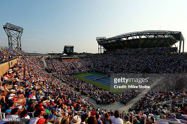 Fans watch from Louis Armstrong Stadium as Rafael Nadal of Spain plays against Diego Schwartzman of Argentina during their Men's Singles Second Round...