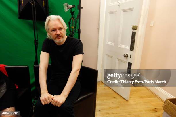Julian Assange the creator of WikiLeaks and refugee since June 2012 at the Embassy of Ecuador is photographed for Paris Match on March 28, 2014 in...
