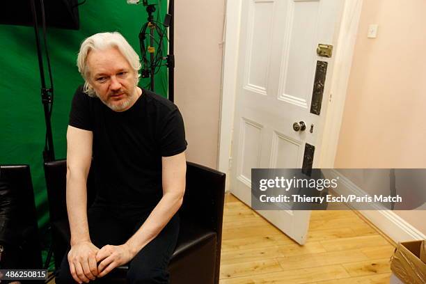 Julian Assange the creator of WikiLeaks and refugee since June 2012 at the Embassy of Ecuador is photographed for Paris Match on March 28, 2014 in...