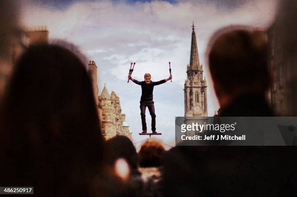 Street performer entertains a crowd on the Royal Mile on April 23, 2014 in Edinburgh, Scotland. A referendum on whether Scotland should be an...