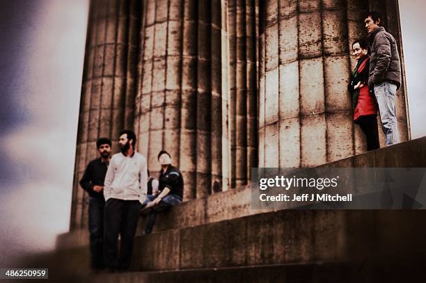 People stand on the National Monument on Calton Hill on April 23, 2014 in Edinburgh, Scotland. A referendum on whether Scotland should be an...