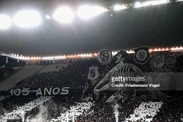Fans of Corinthians celebrates the 105 birthday during the match between Corinthians and Fluminense for the Brazilian Series A 2015 at Arena...