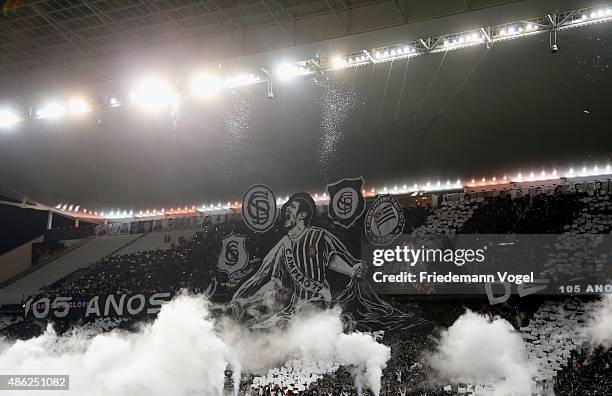 Fans of Corinthians celebrates the 105 birthday during the match between Corinthians and Fluminense for the Brazilian Series A 2015 at Arena...