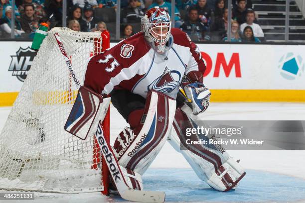 Jean-Sebastien Giguere of the Colorado Avalanche protects the net against the San Jose Sharks at SAP Center on April 11, 2014 in San Jose, California.