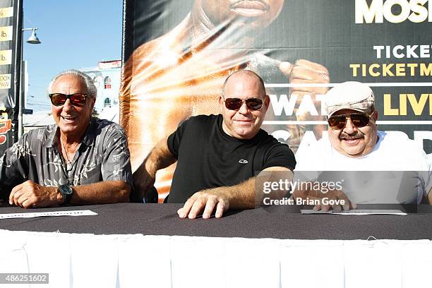 Personality Chuy Bravo and judges attend weigh-in press conference for Shane Mosley vs Ricardo Mayorga at Venice Beach on August 28, 2015 in Venice,...