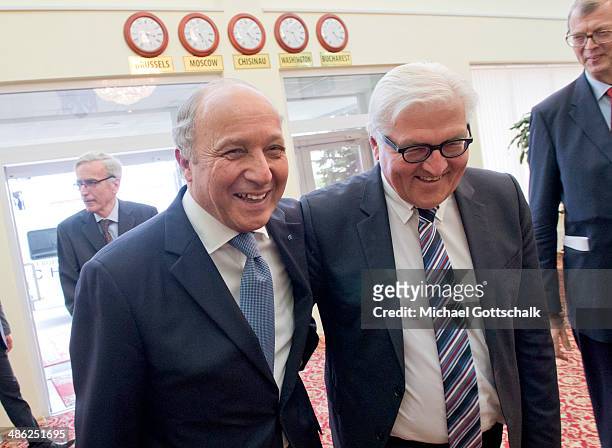 German Foreign Minister Frank-Walter Steinmeier greets French Foreign Minister Laurent Fabius on April 23, 2014 in Chisinau, Moldova. German foreign...
