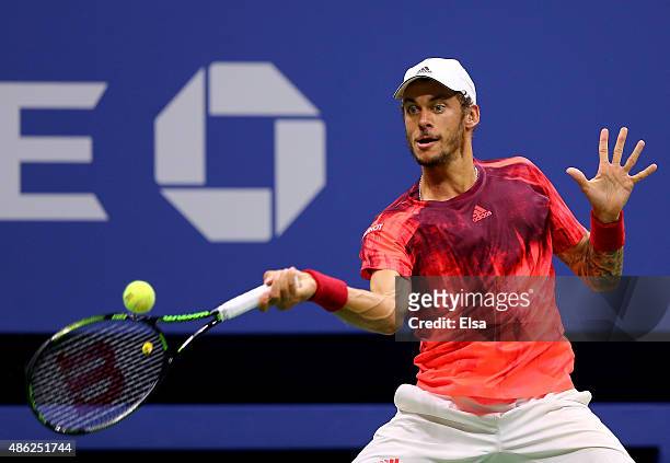 Andreas Haider-Maurer of Austria returns a shot to Novak Djokovic of Serbia on Day Three of the 2015 US Open at the USTA Billie Jean King National...