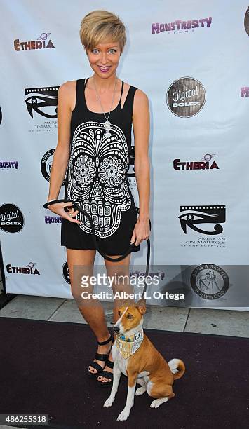 Director Axelle Carolyn with Anubis arrives for the Etheria Film Night 2015 held at American Cinematheque's Egyptian Theatre on June 13, 2015 in...
