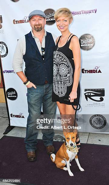 Director Axelle Carolyn and director Neil Marshall with Anubis arrives for the Etheria Film Night 2015 held at American Cinematheque's Egyptian...