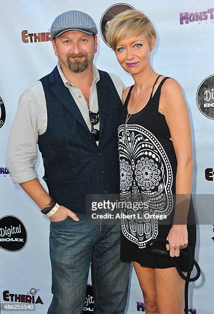 Director Axelle Carolyn and director Neil Marshall arrive for the Etheria Film Night 2015 held at American Cinematheque's Egyptian Theatre on June...