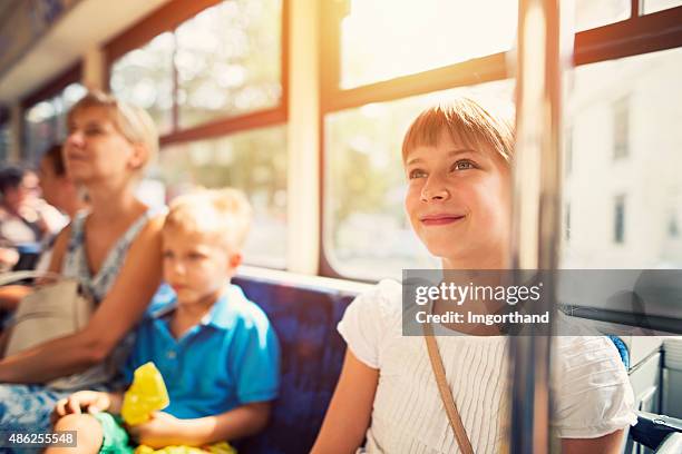 Kids Using Bus 31,429 Children On The Bus Stock Photos, High-Res Pictures, and Images ...