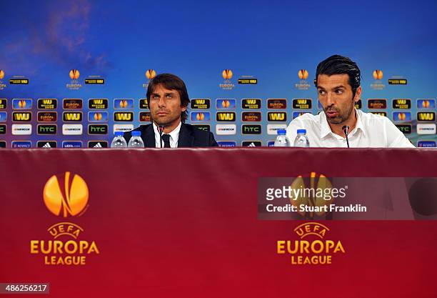 Antonio Conte,head coach of Juventus and goal keeper Gianluigi Buffon talk with the media during the press conference of SL Benfica prior to the UEFA...