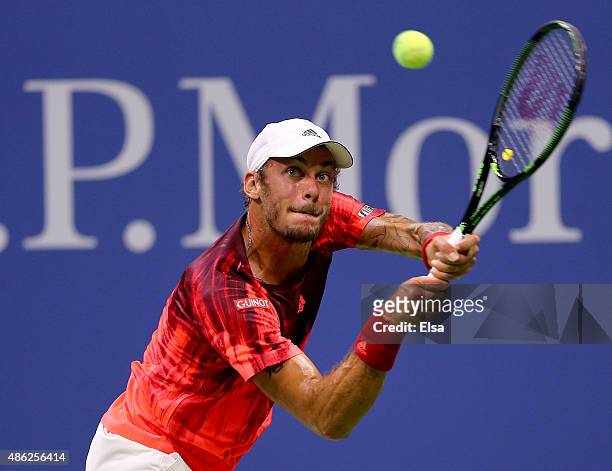 Andreas Haider-Maurer of Austria returns a shot to Novak Djokovic of Serbia on Day Three of the 2015 US Open at the USTA Billie Jean King National...