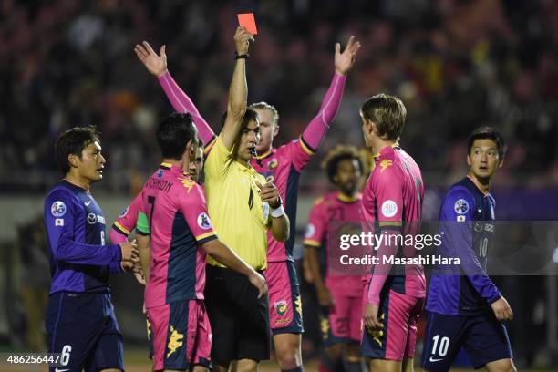 Referee Ravshan Irmatov shows Red card to Brent Griffiths of Central coast mariners during the AFC Champions League Group F match between Sanfrecce...