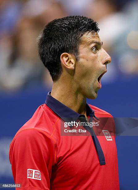 Novak Djokovic of Serbia reacts in the first set against Andreas Haider-Maurer of Austria on Day Three of the 2015 US Open at the USTA Billie Jean...