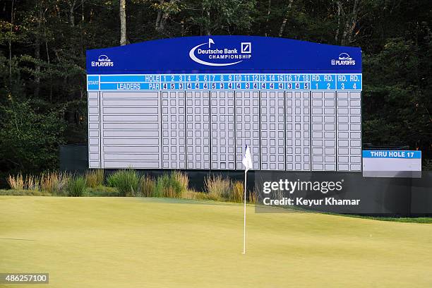 The leaderboard stands behind the 18th hole green during practice for the Deutsche Bank Championship at TPC Boston on September 2, 2015 in Norton,...