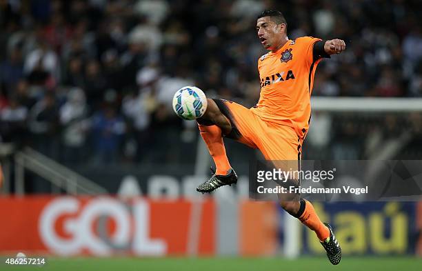 Ralf of Corinthians runs with the ball during the match between Corinthians and Fluminense for the Brazilian Series A 2015 at Arena Corinthians on...
