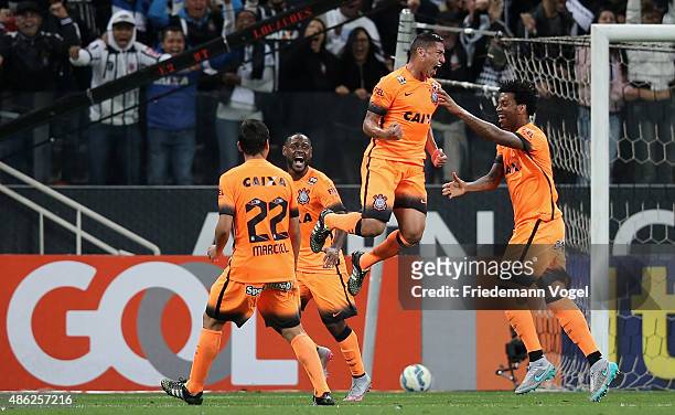 Ralf of Corinthians celebrates scoring the second goal with his team during the match between Corinthians and Fluminense for the Brazilian Series A...