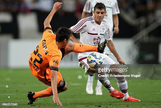Marciel of Corinthians fights for the ball with Edson of Fluminense during the match between Corinthians and Fluminense for the Brazilian Series A...