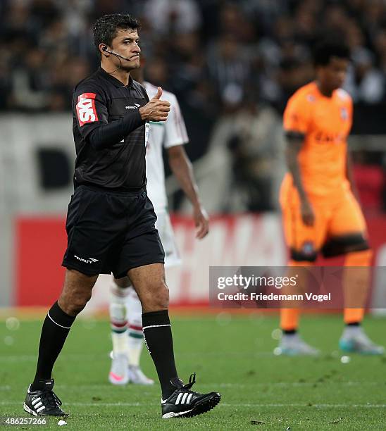 Referee Sandro Meira Ricci gives advise during the match between Corinthians and Fluminense for the Brazilian Series A 2015 at Arena Corinthians on...