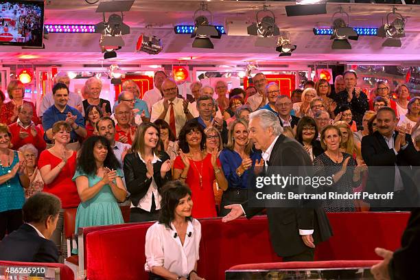 Main guests of the show, Actors Pierre Arditi and his wife Evelyne Bouix acknowledge the applause of the audience during the 'Vivement Dimanche'...