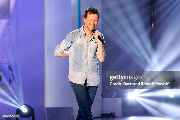 Singer Alex Beaupain performs and presents his album "Les gens dans l'enveloppe" during the 'Vivement Dimanche' French TV Show. Held at Pavillon...