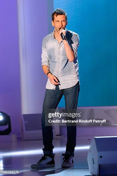 Singer Alex Beaupain performs and presents his album "Les gens dans l'enveloppe" during the 'Vivement Dimanche' French TV Show. Held at Pavillon...