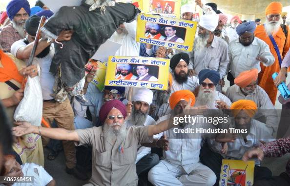 Members of 1984 Anti-Sikh riots victims during a protest against the ...
