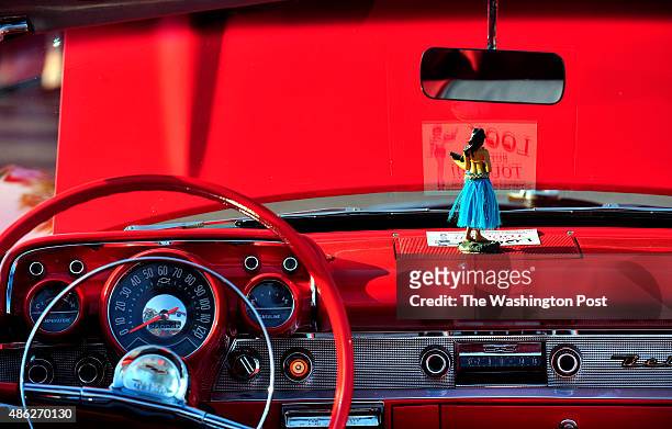 At the Sterling, Va. Car cruise-in a 1957 Chevy is on display complete with a dash board hula girl. The car culture in the U.S. Is changing as a new...