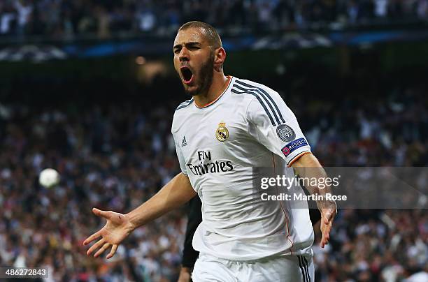 Karim Benzema of Real Madrid celebrates scoring the opening goal during the UEFA Champions League semi-final first leg match between Real Madrid and...