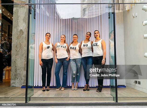 Evans stage a live window display featuring Milk Model Management and Bridge Models to celebrate UK Plus Size Fashion Week on September 3, 2015 in...