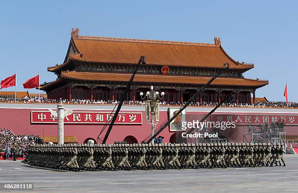 Soldiers of China's People's Liberation Army march past Tiananmen Gate during the military parade marking the 70th anniversary of the end of World...